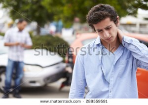 stock-photo-teenage-driver-suffering-whiplash-injury-traffic-accident-289559591